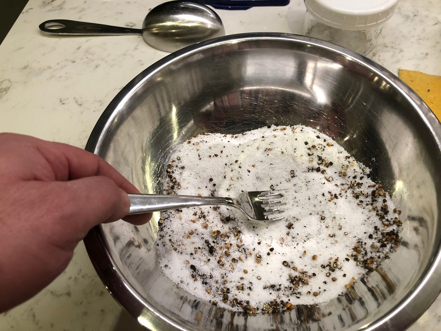 A mixing bowl holding the combined cure