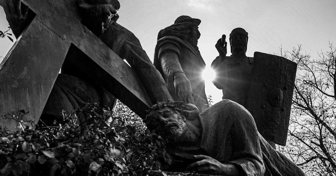 Statues depicting jesus carrying the cross