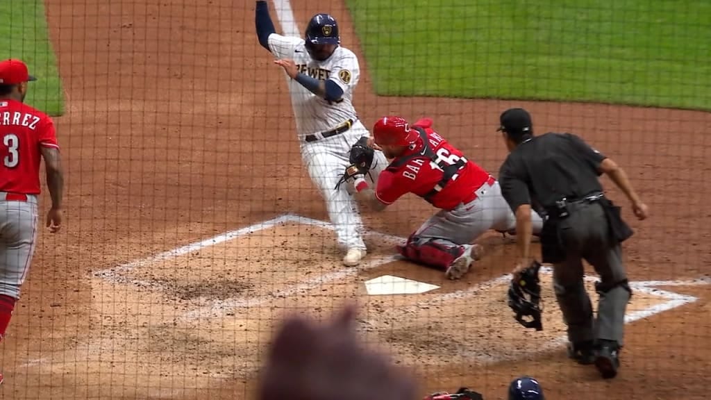Runner being tagged out at home plate