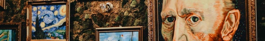man in brown suit painting