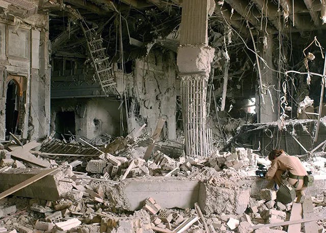 The heavily damaged Arab Socialist Ba’ath Party headquarters in Baghdad, April 2003, reflecting the intense conflict. The heavily damaged Arab Socialist Ba’ath Party headquarters in Baghdad, April 2003, reflecting the intense conflict.