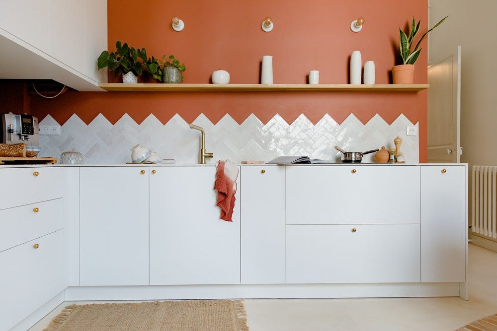 Terracotta kitchen with chevron zigzag tiles
