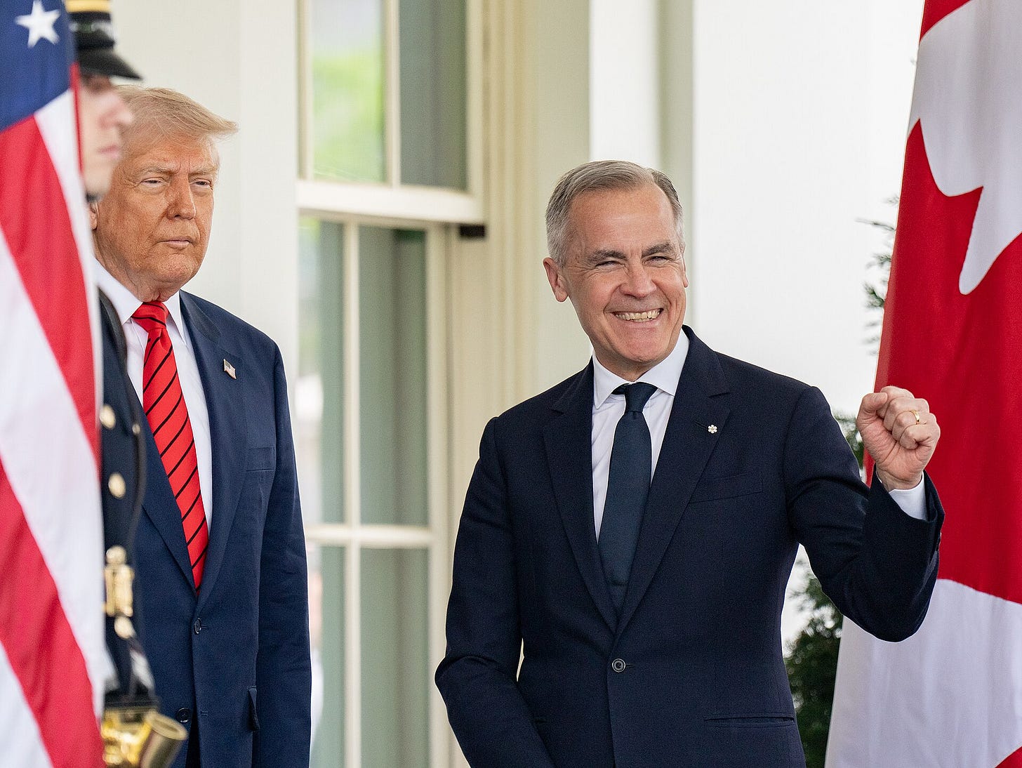 Marc Carney smiling and raising fist; off to the side is Trump looking old and unhappy. an american flatg is on one side, a Canadian flag on the other