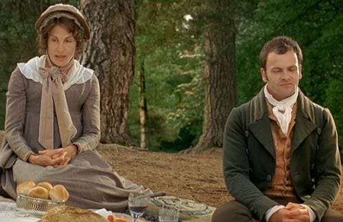 Mr. Knightley and Miss Bates at a picnic on Box Hill. 