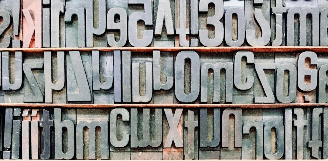 black alphabetical wall decor