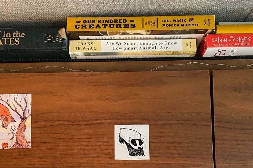 A photo of our van's bookshelf showing Frans de Waal's Are We Smart Enough to Know How Smart Animals Are on display A photo of our van's bookshelf showing Frans de Waal's Are We Smart Enough to Know How Smart Animals Are on display