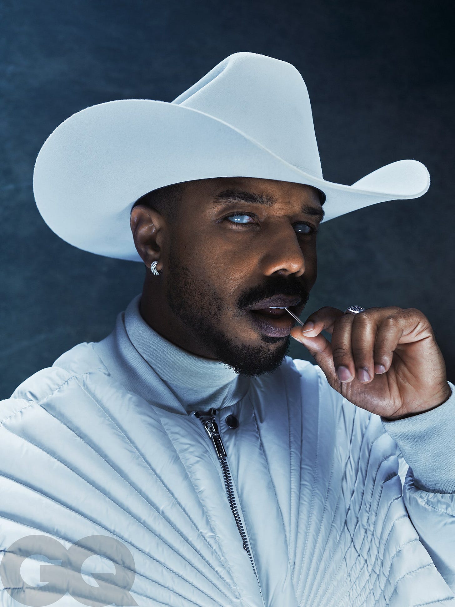 Image may contain Michael B. Jordan Clothing Hat Adult Person Face and Head