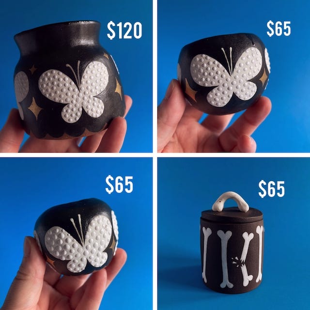 There's so many. They are all of ceramic items that will be in my shop update. Most of them are a little spooky, like skulls and moths and lots of black.