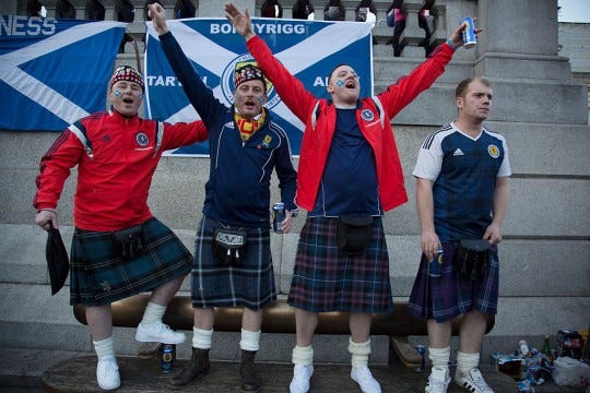 Scotland fans wearing kilts