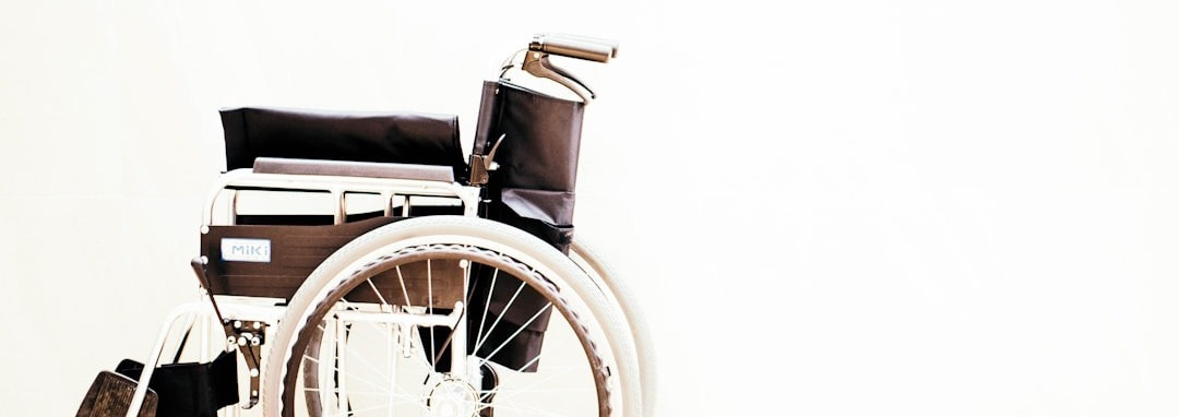 a wheelchair with wheels is shown against a white background