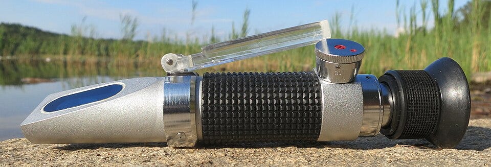 1990s portable german refractometer. Looks sort of like a handheld vacuum.