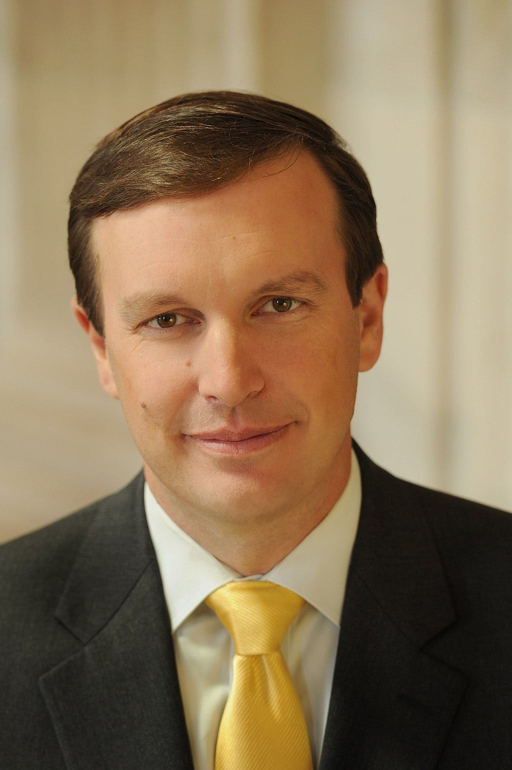 chris murphy official portrait; with yellow tie and very combed hair