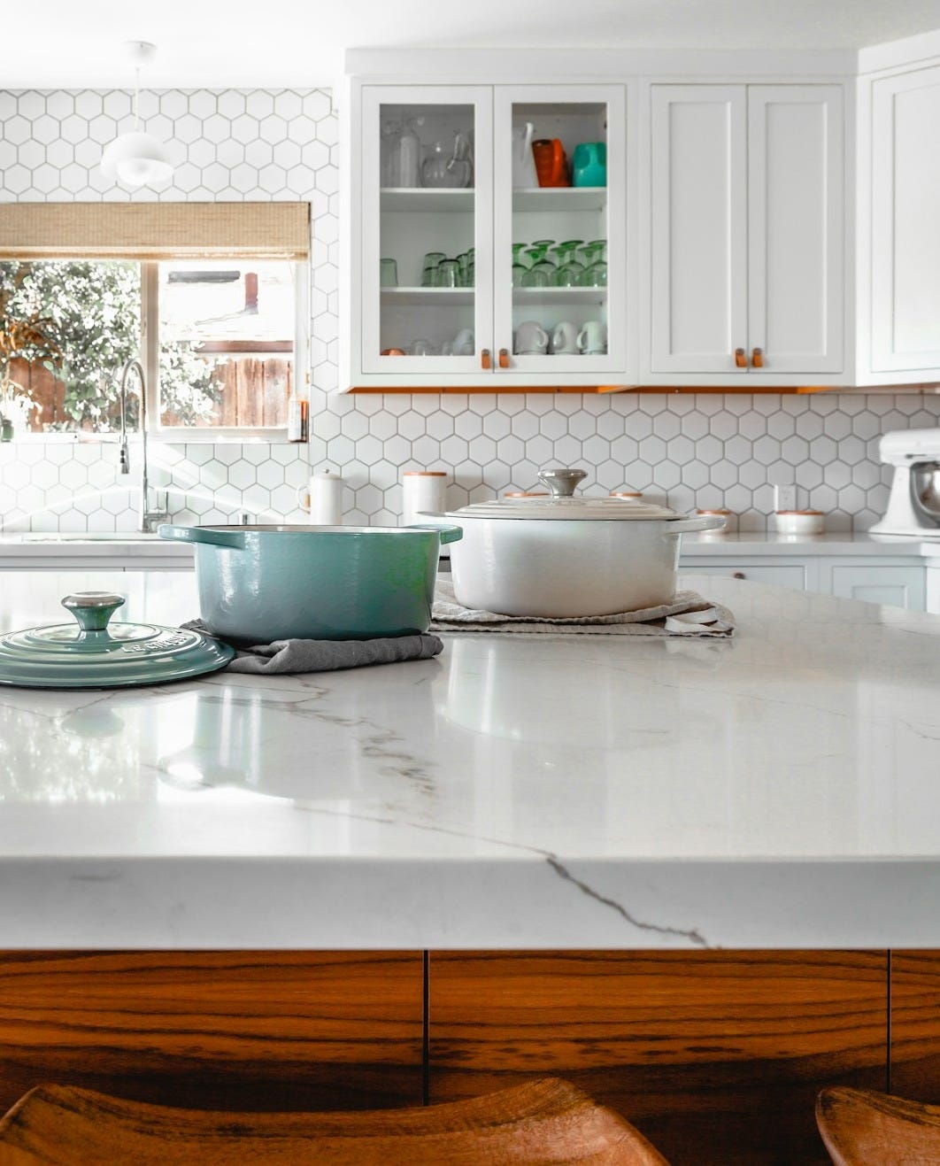 two cooking pots on kitchen island