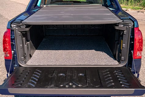 Cadillac Escalade EXT | Photo: Bring a Trailer
