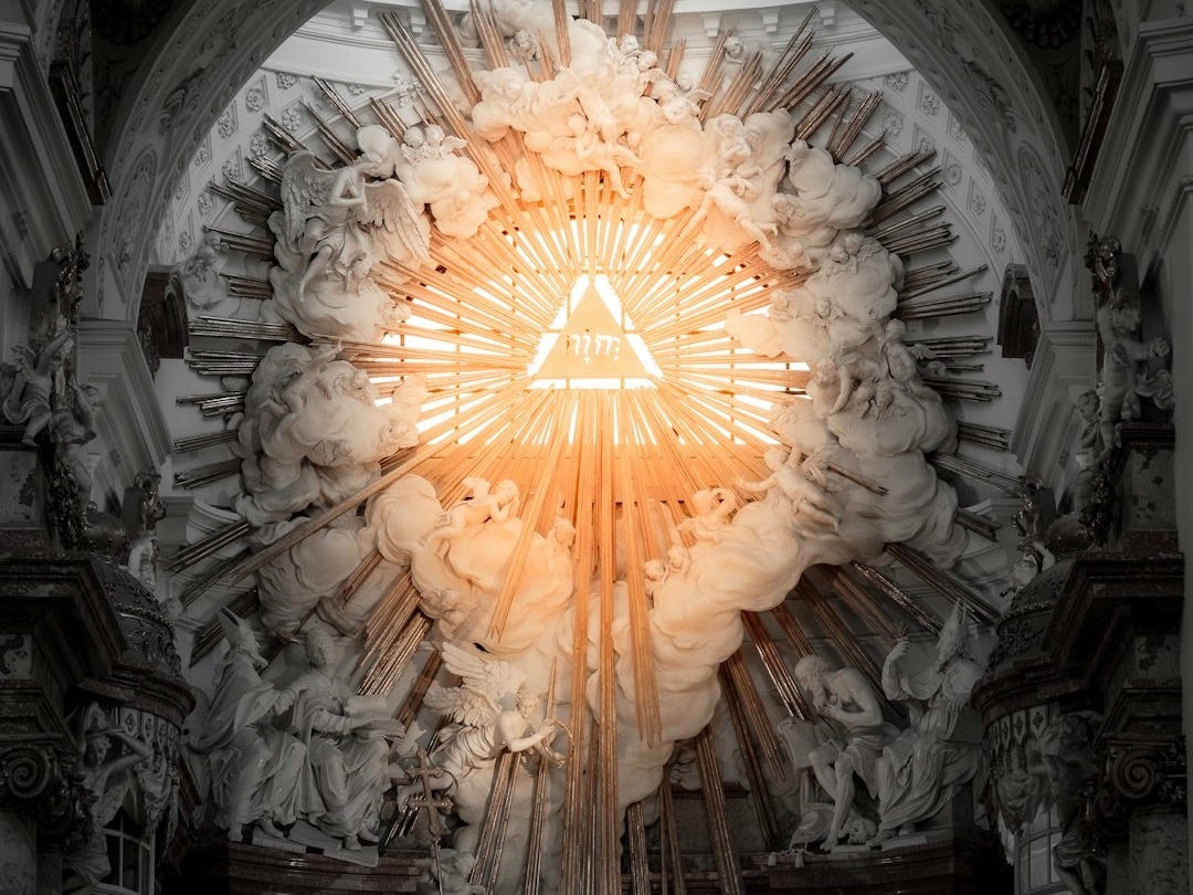 Inside a church, a glowing eye is centered.