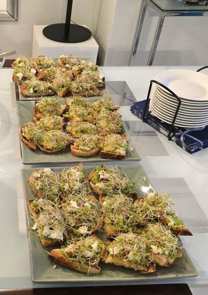 A group of plates of food

AI-generated content may be incorrect.