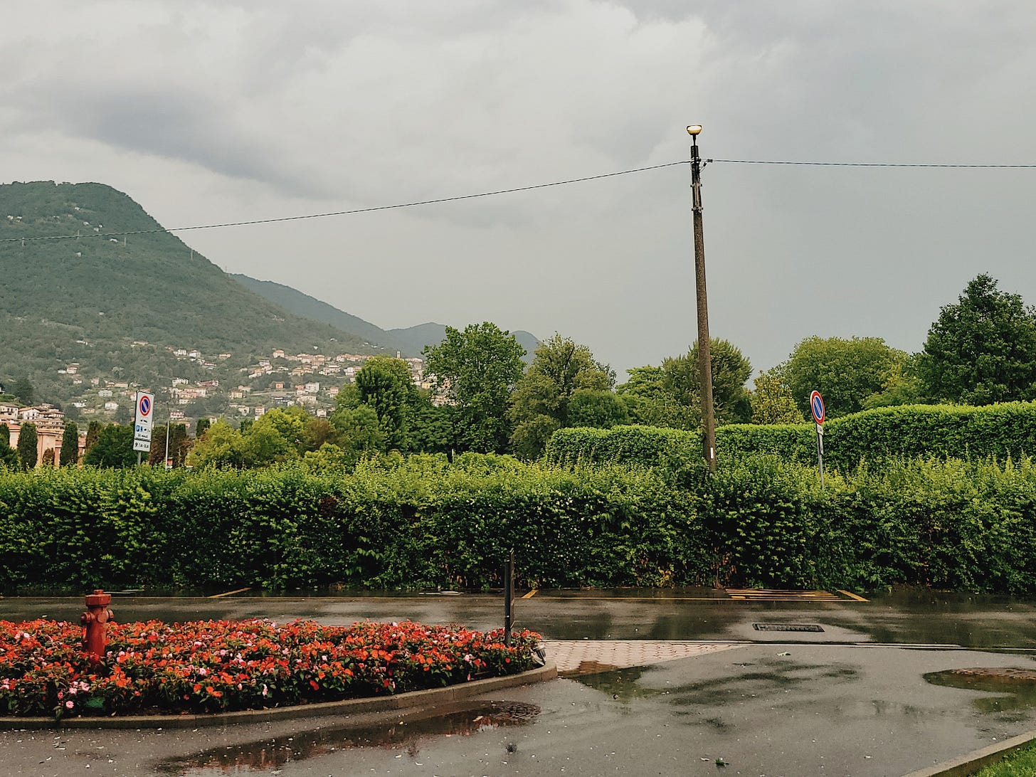 Gray rain clouds obscuring the hills outside Sheraton Lake Como Gray rain clouds obscuring the hills outside Sheraton Lake Como