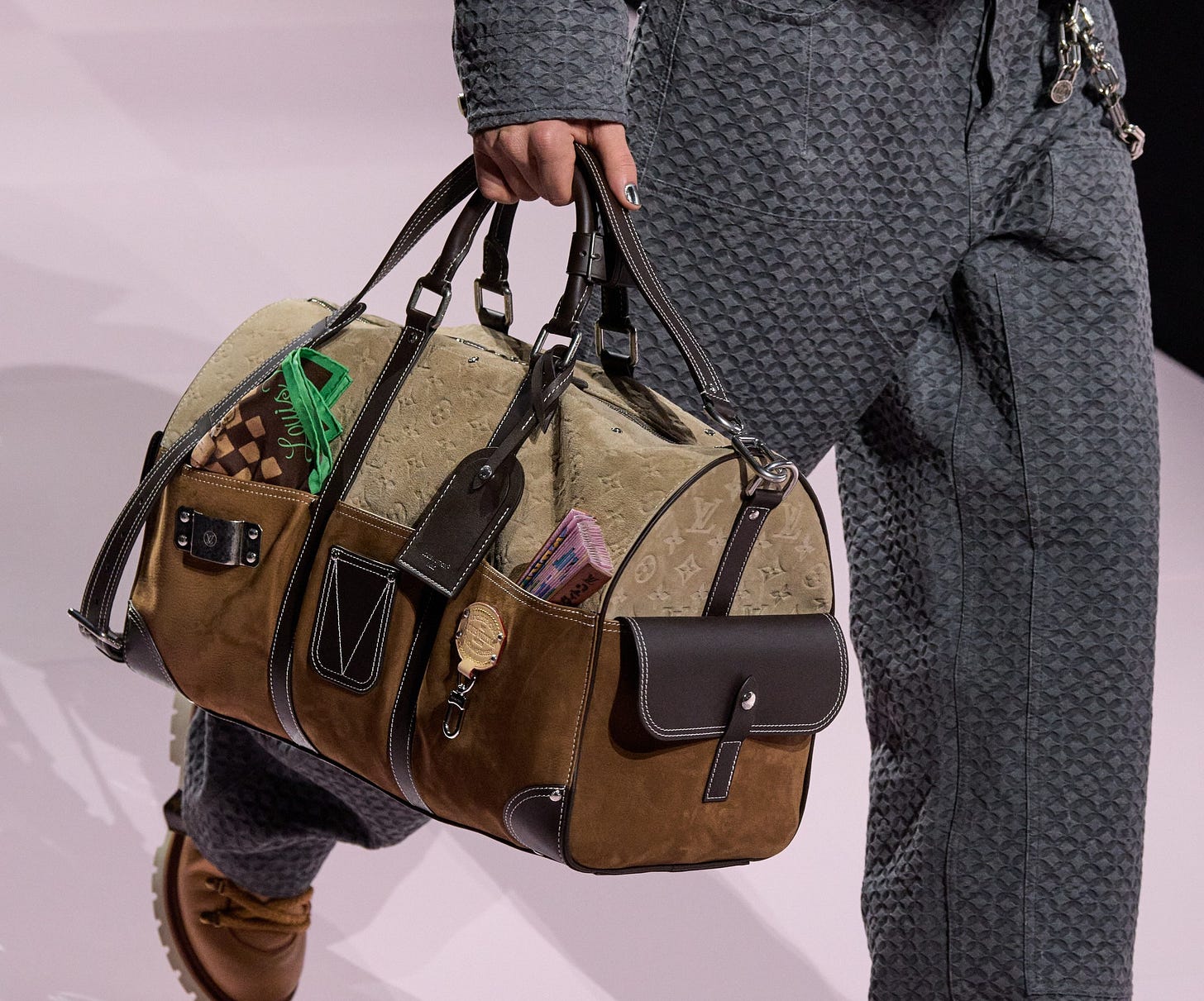 Image may contain Accessories Bag Handbag Clothing Footwear Shoe Adult Person and Baggage