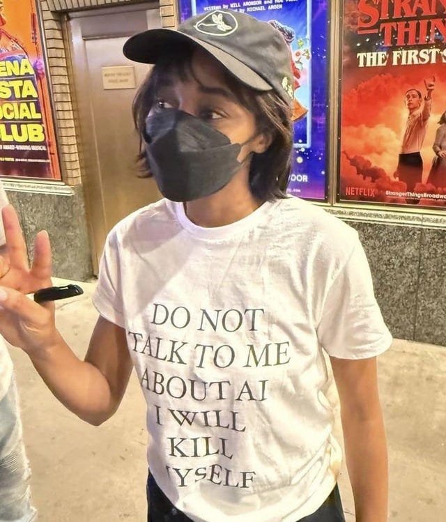 r/popculturechat - Ayo Edebiri wearing a “Do Not Talk To Me About AI, I Will Kill Myself” shirt.