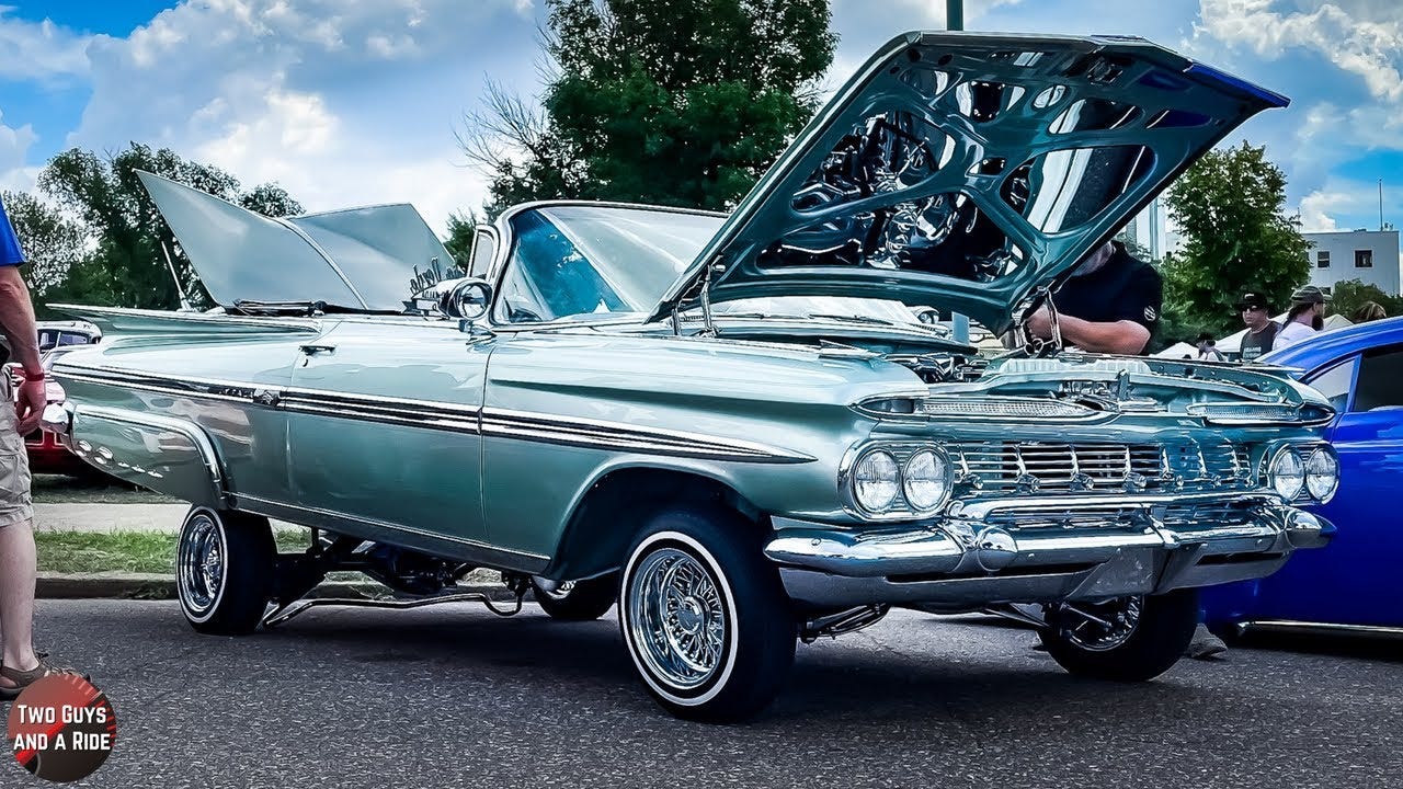 A person standing next to a car with the hood up
AI-generated content may be incorrect. A person standing next to a car with the hood up
AI-generated content may be incorrect.