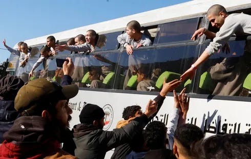 Freed Palestinian prisoners are greeted after being released from an Israeli jail as part of a hostages-prisoners swap and a ceasefire deal in Gaza between Hamas and Israel, in Khan Younis in the southern Gaza Strip, February 27, 2025.