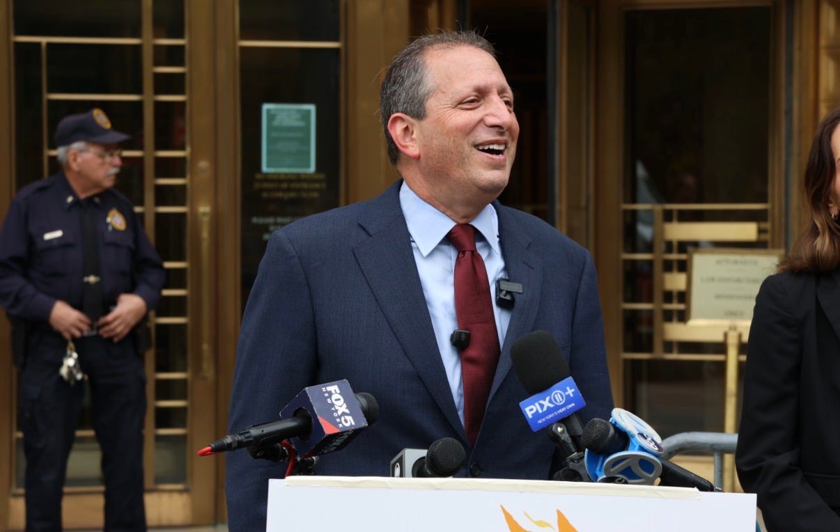 Speaking outside the courthouse today.