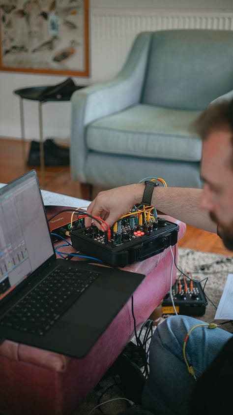 Musicians working with Music Thing Modular Workshop Systems and other instruments