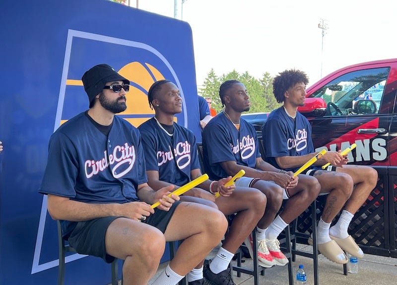 Bitadze, Mathurin, Nesmith and Brown taking dozens of photos with fans.