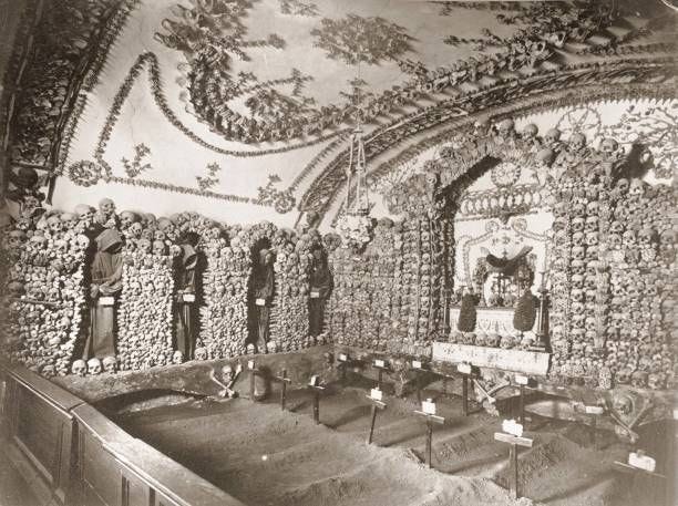 View of the catacombs located underneath the Capuchin monastery in Rome, 1880s.