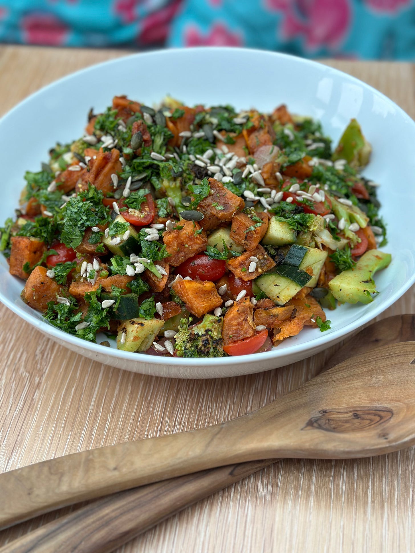 Photo of roasted sweet potato salad with grapes, pickled chilis and sundried tomatoes