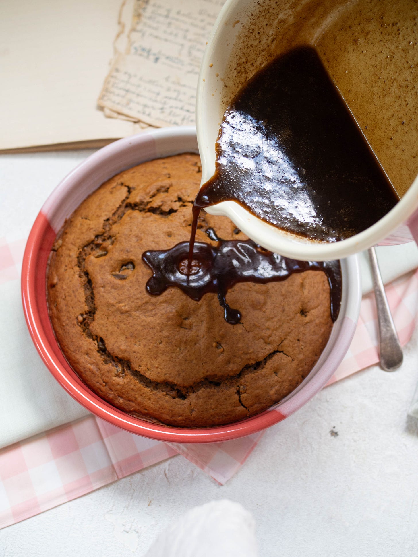 Caramel Ginger Pudding pouring caramel over top