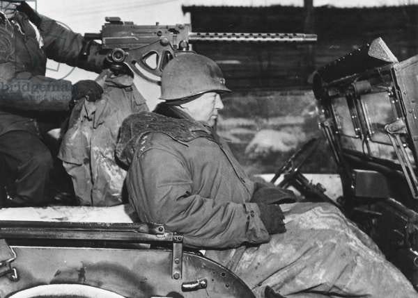 General Patton, Third Army commander, on a jeep at the German Front,  02/1945 (b/w