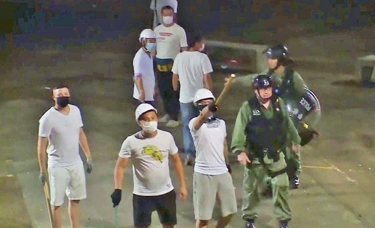 2 months ago in Hong Kong, hundreds of men in white shirts stormed a ...