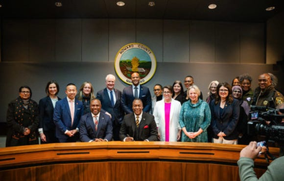Group at Emergency Bill signing regarding privately owned detention centers