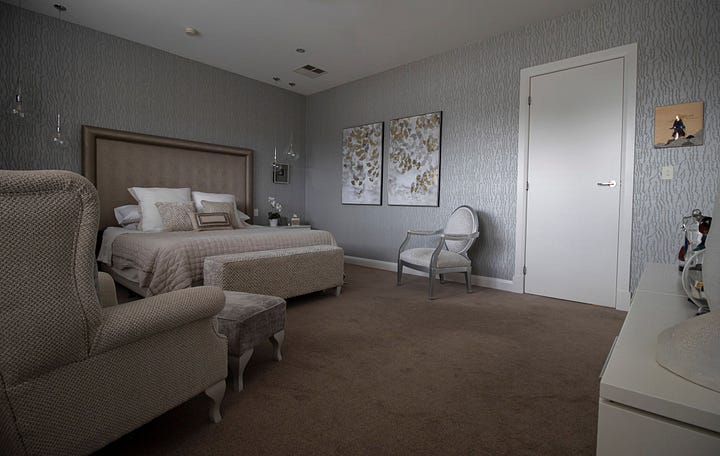 luxurious main bedroom in an apartment designed by Plush Design Interiors and Penelope Herbert