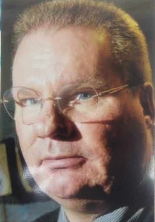 Former Detective John T. Geiss