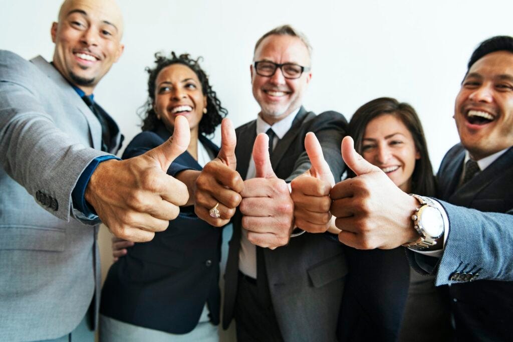 People giving thumbs up