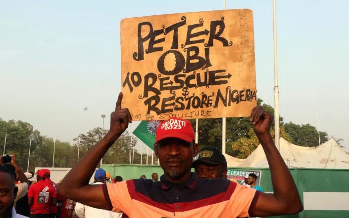 A supporter of Nigeria's Labour Party's Presidential Candidate Peter Obi at an election campaign rally in Abuja - Emmanuel Osodi/AP A supporter of Nigeria's Labour Party's Presidential Candidate Peter Obi at an election campaign rally in Abuja - Emmanuel Osodi/AP