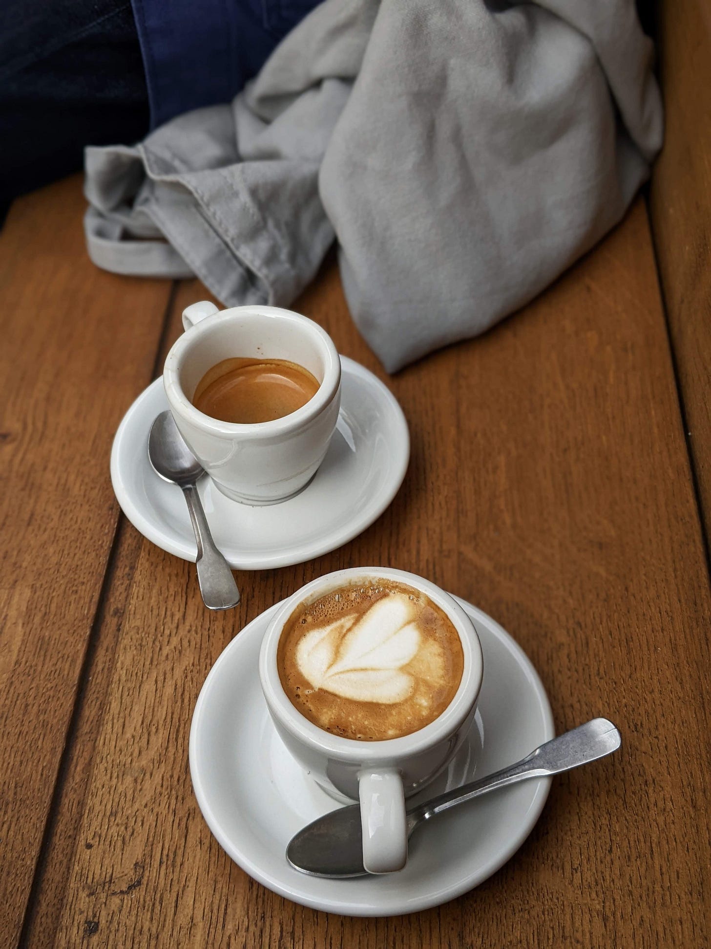 Outdoor coffee on a bench in Paris, France
