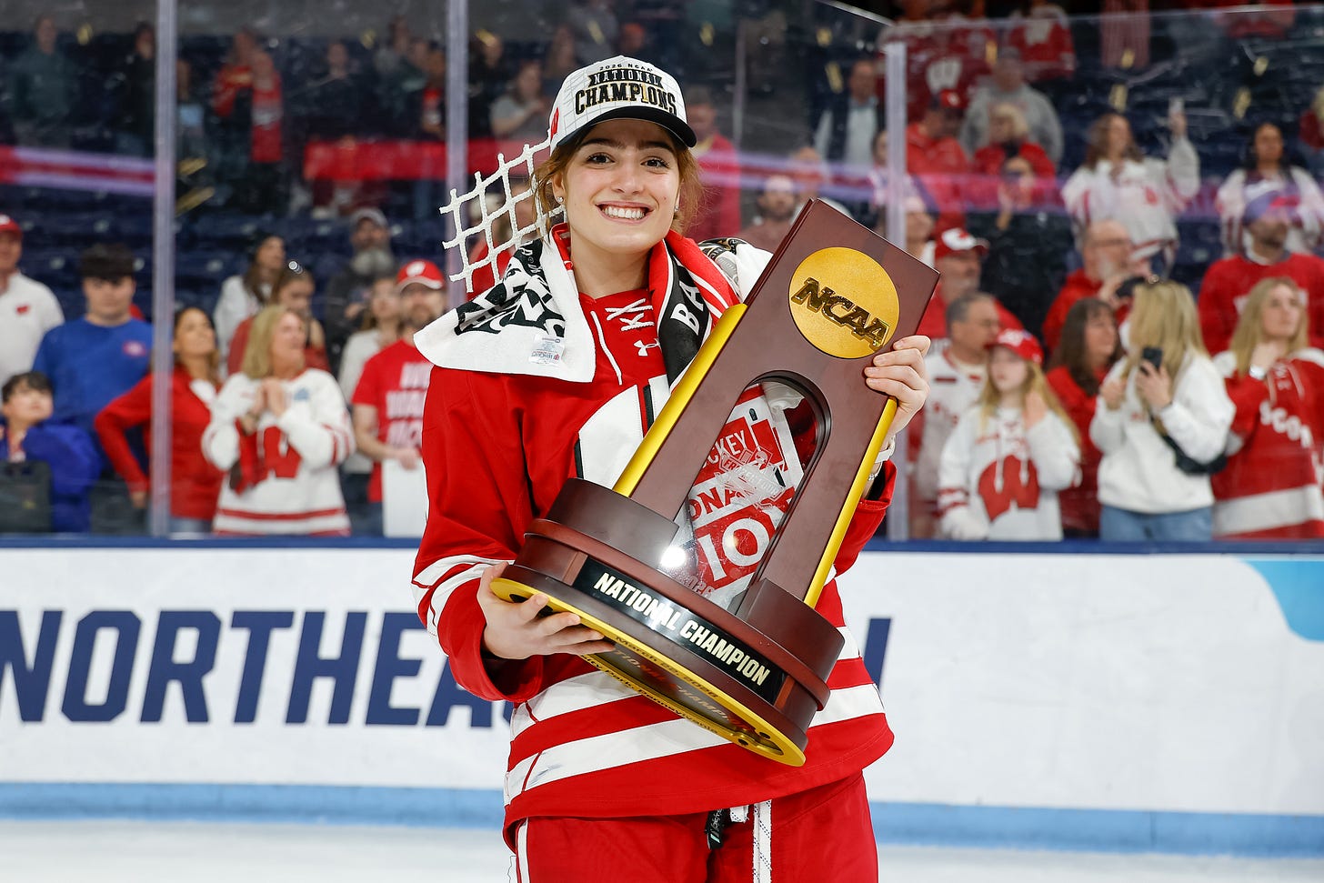 Ava Murphy poses with the national championship trophy