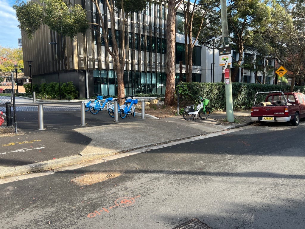 On campus, blocking an emergency street (protected by bollards, but the fire equipment would want to use this if there were an actual emergency). It could be worse.