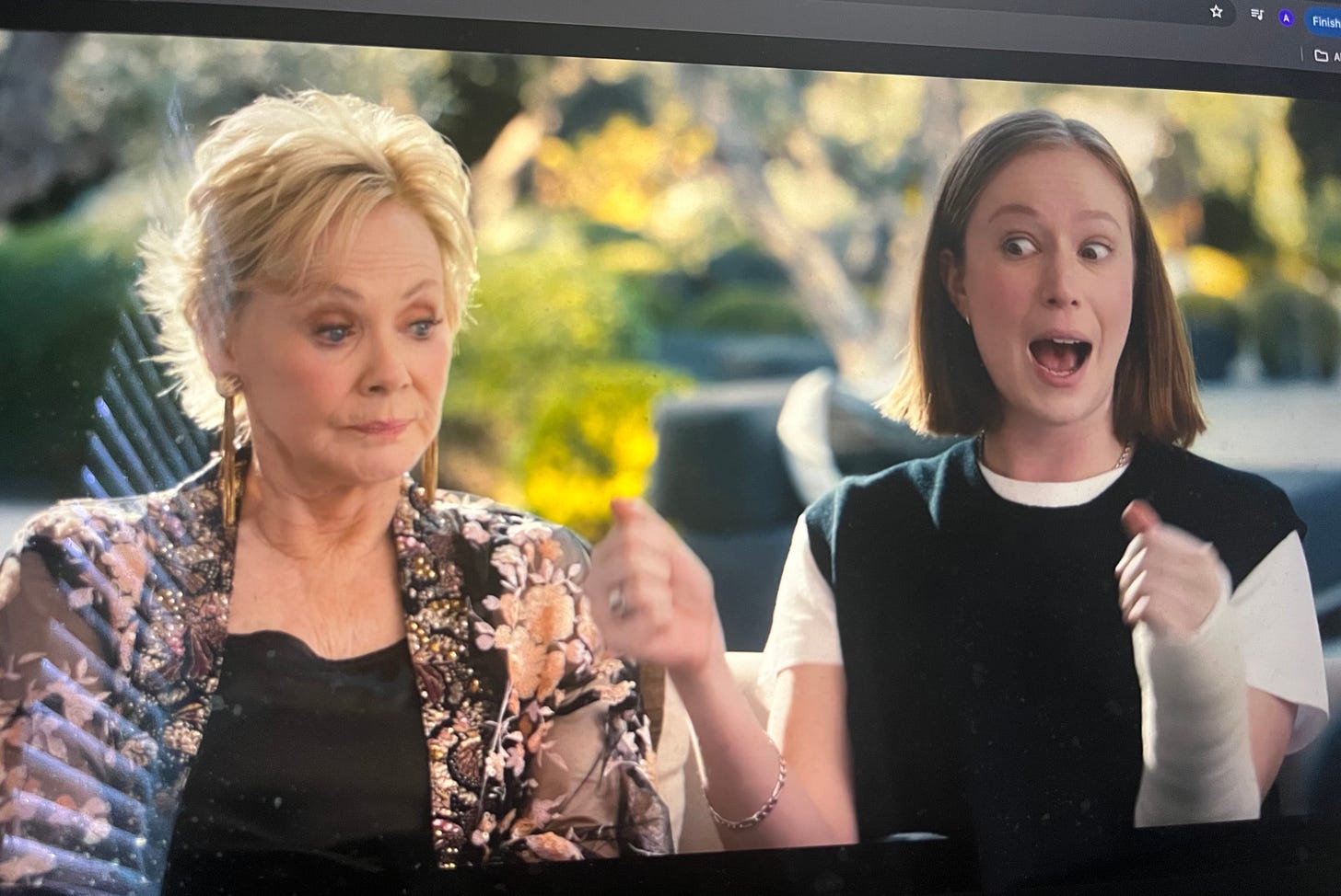 Still from Hacks where Deborah looks irritated and Ava looks manic