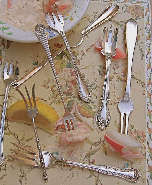 A selection of lobster picks, including one with its very own claws.
