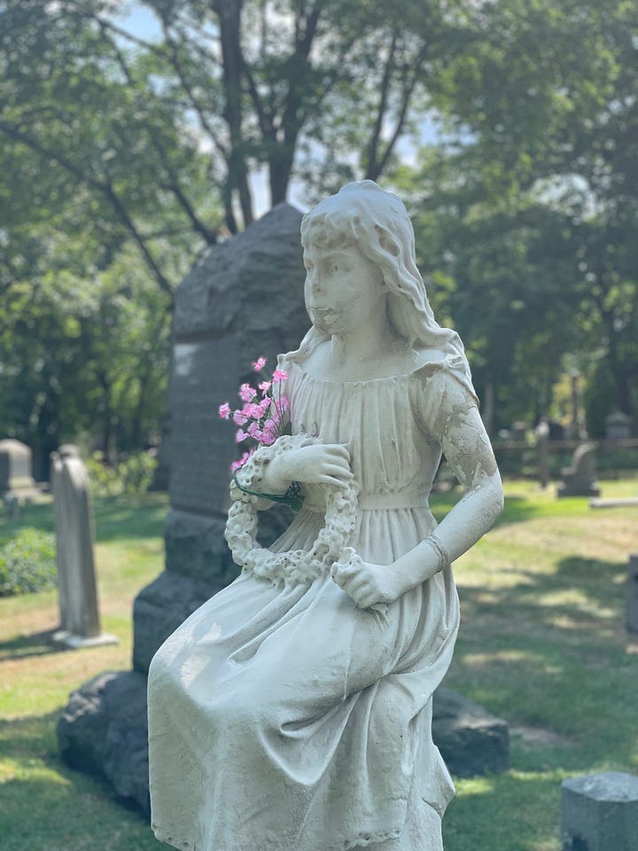 gravestones, statues