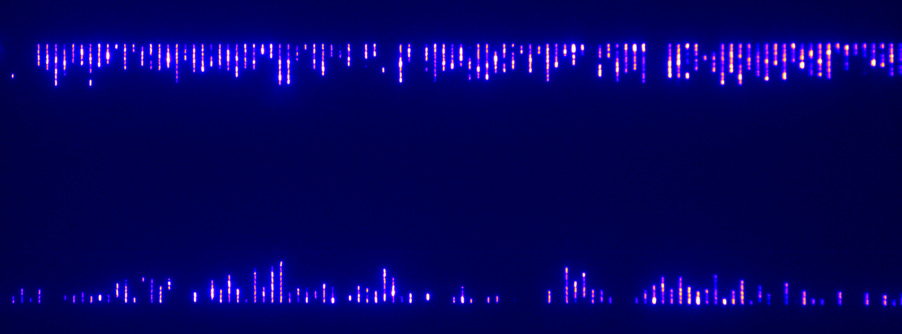 A blue screen with purple and yellow lights

AI-generated content may be incorrect.