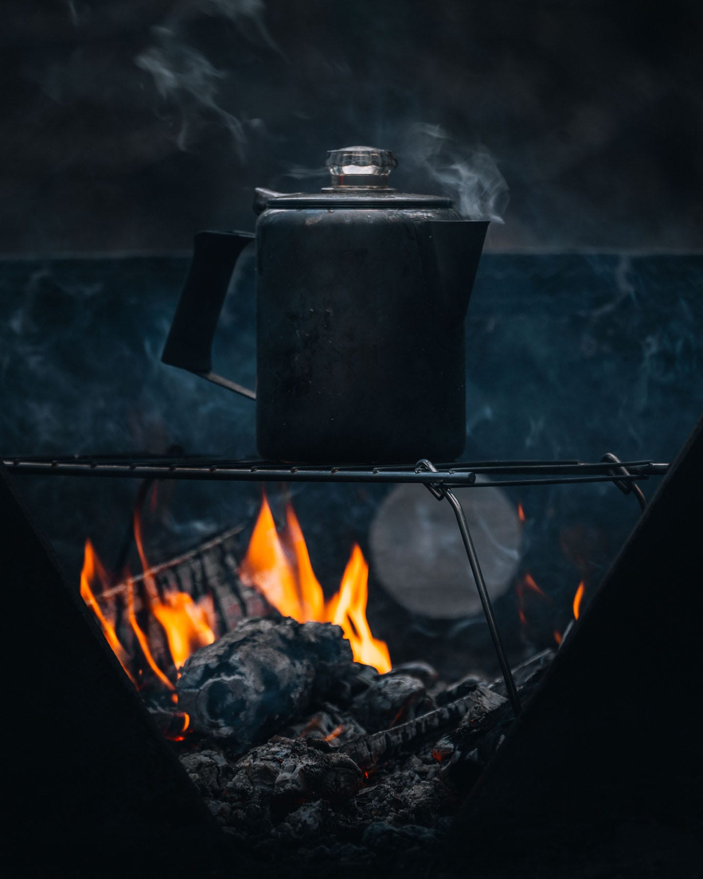Percolating coffee on a campfire.