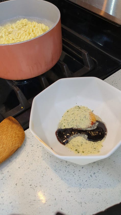 Buldak carbonara packet being opened, cooked, sauce packets mixed and finished noodles raised with chopsticks from the bowl.