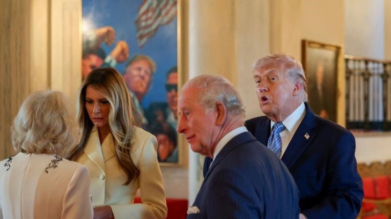 Charles and Camilla speak to the Trumps in front of the portrait.