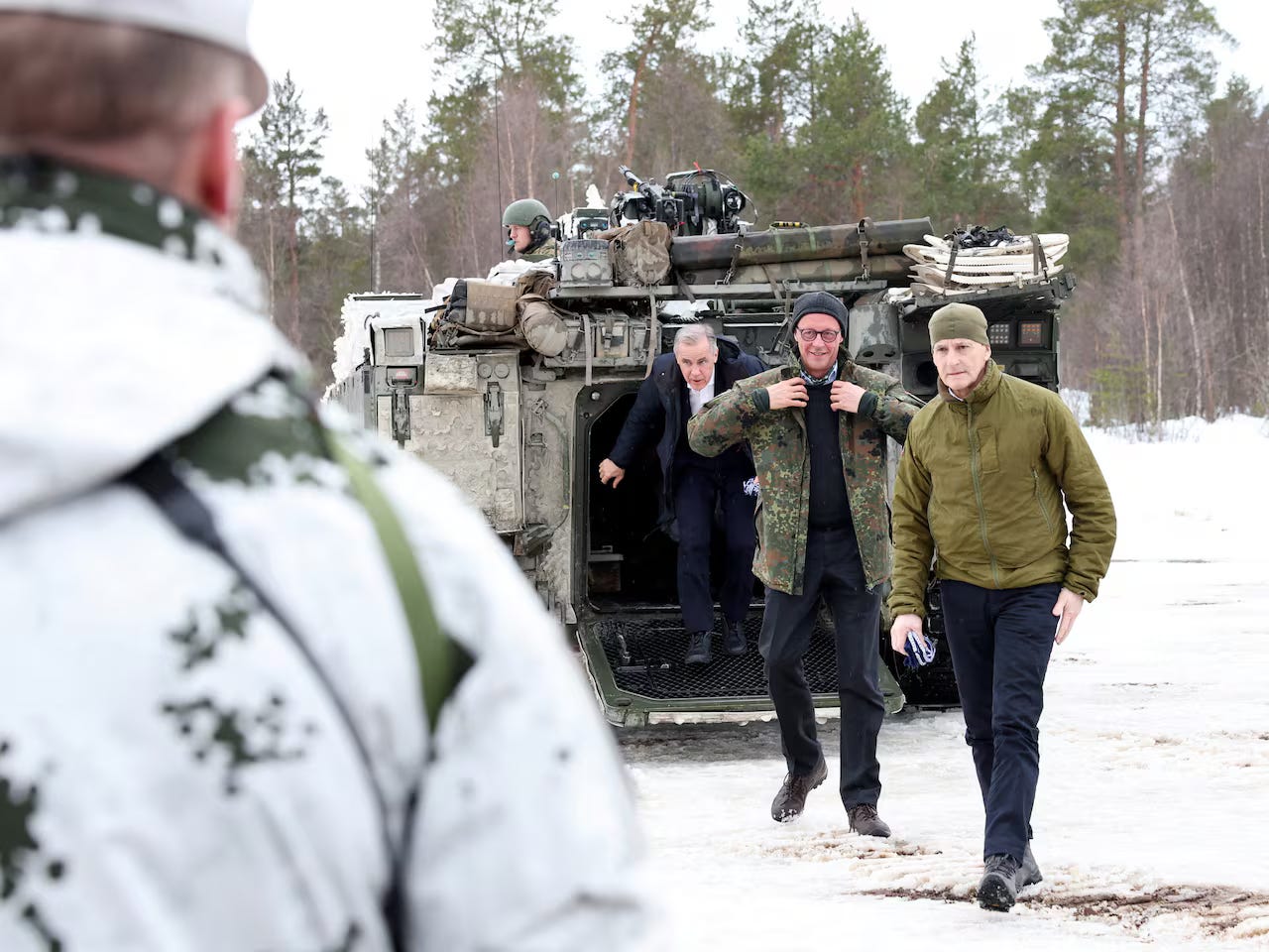 A group of men walking out of a military vehicle
AI-generated content may be incorrect. A group of men walking out of a military vehicle
AI-generated content may be incorrect.