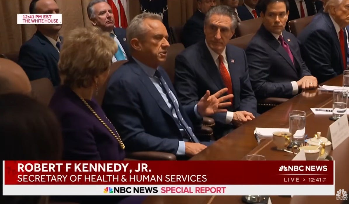 Video screenshot of NBC News report showing RFK Jr. at cabinet meeting, gesturing with one hand as he answers a question about the Texas measles outbreak. Video screenshot of NBC News report showing RFK Jr. at cabinet meeting, gesturing with one hand as he answers a question about the Texas measles outbreak.
